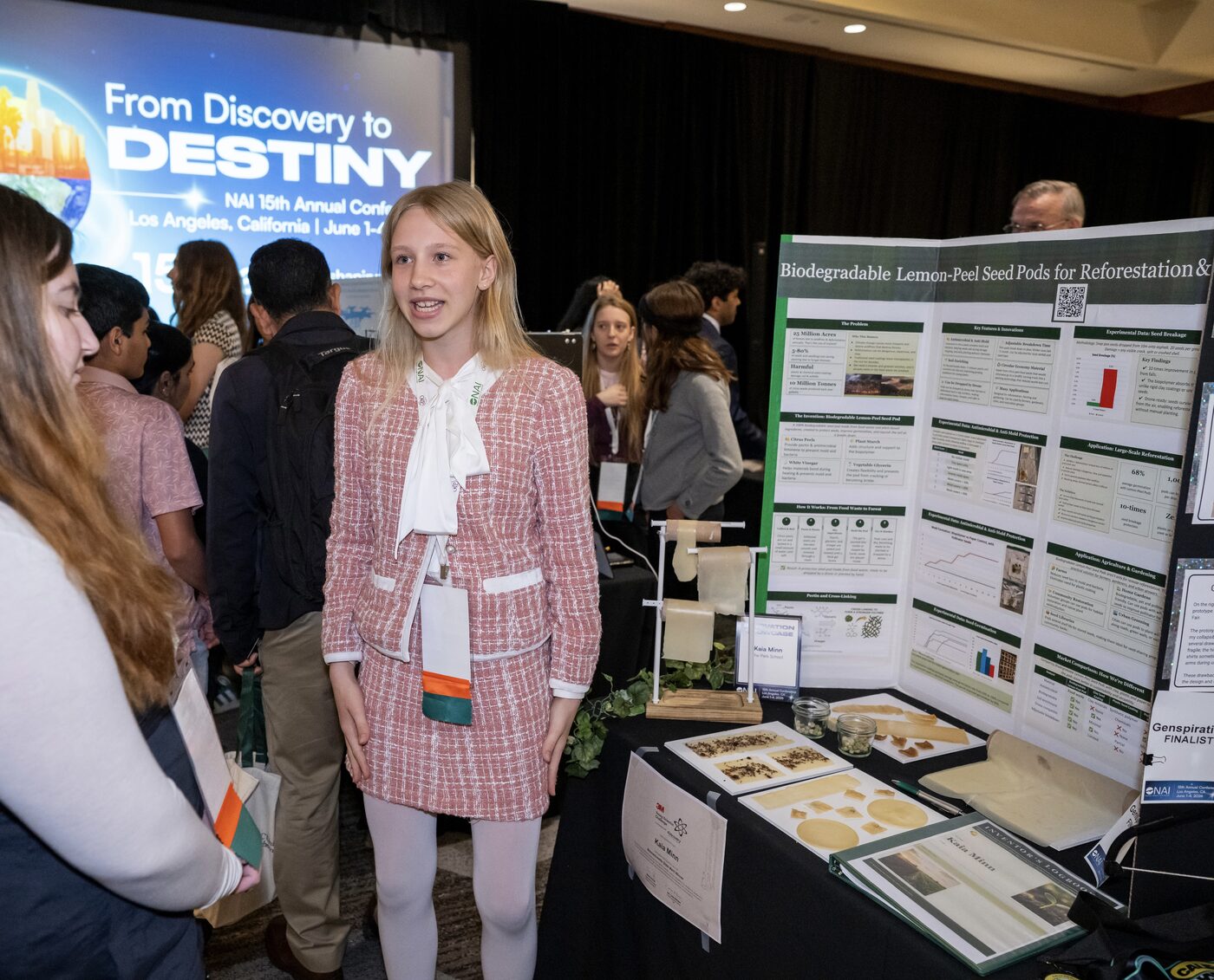 Kaia Minn presenting her Biodegradable Lemon-Peel Seed Pod research poster